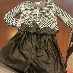 Girls 2-pc black & white outfit: Black pleather shorts, b&w button top.